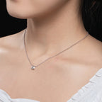 1ct emerald moissanite pendant, 18K gold plated, lifestyle shot — Aurora Moissanite
