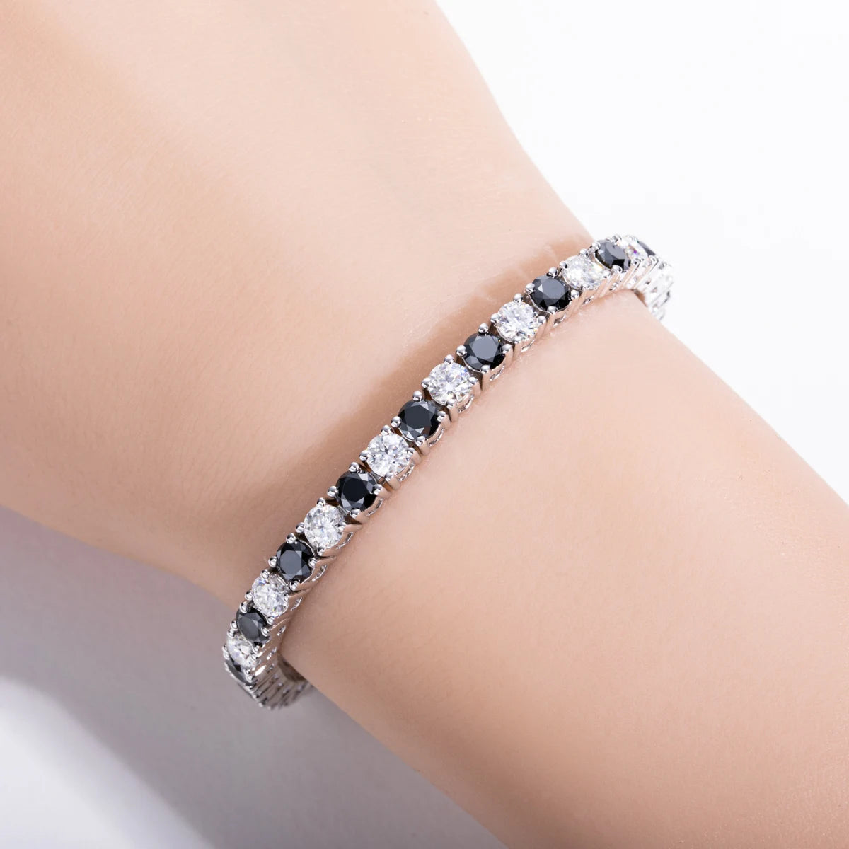 Black moissanite bracelet close-up, 4mm opaque round stones, lab-created — Aurora Moissanite