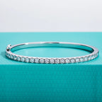 The Lace Bracelet — 3mm moissanite half-eternity bangle, front view — Aurora Moissanite