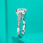 The Flare Ring — 3ct emerald moissanite solitaire, front view, 18K gold — Aurora Moissanite