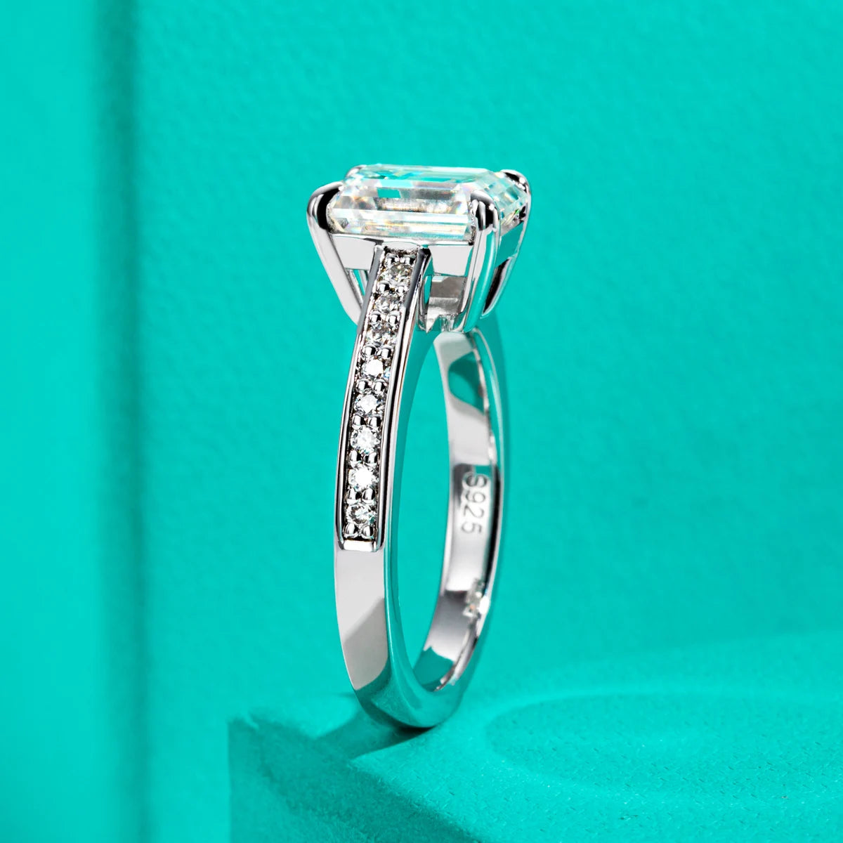 The Flare Ring — 3ct emerald moissanite solitaire, front view, 18K gold — Aurora Moissanite