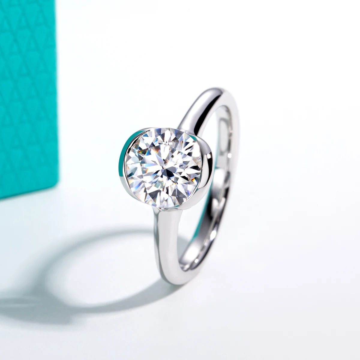The Seren Ring — 2ct round moissanite half-bezel, front view — Aurora Moissanite
