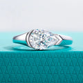 The Kade Ring worn — 2.5ct pear moissanite tension mount, 18K white gold — Aurora Moissanite