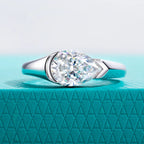 The Kade Ring worn — 2.5ct pear moissanite tension mount, 18K white gold — Aurora Moissanite