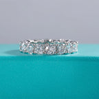 4mm moissanite wedding band, side profile, rhodium plated sterling silver — Aurora Moissanite