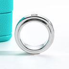The Spin Band lifestyle — moissanite fidget spinner ring worn on finger — Aurora Moissanite