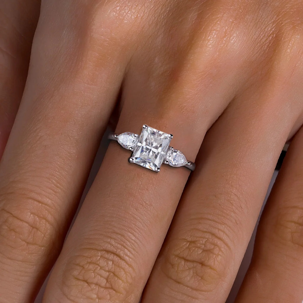 The Dusk Ring lifestyle — two-stone moissanite ring worn on finger — Aurora Moissanite
