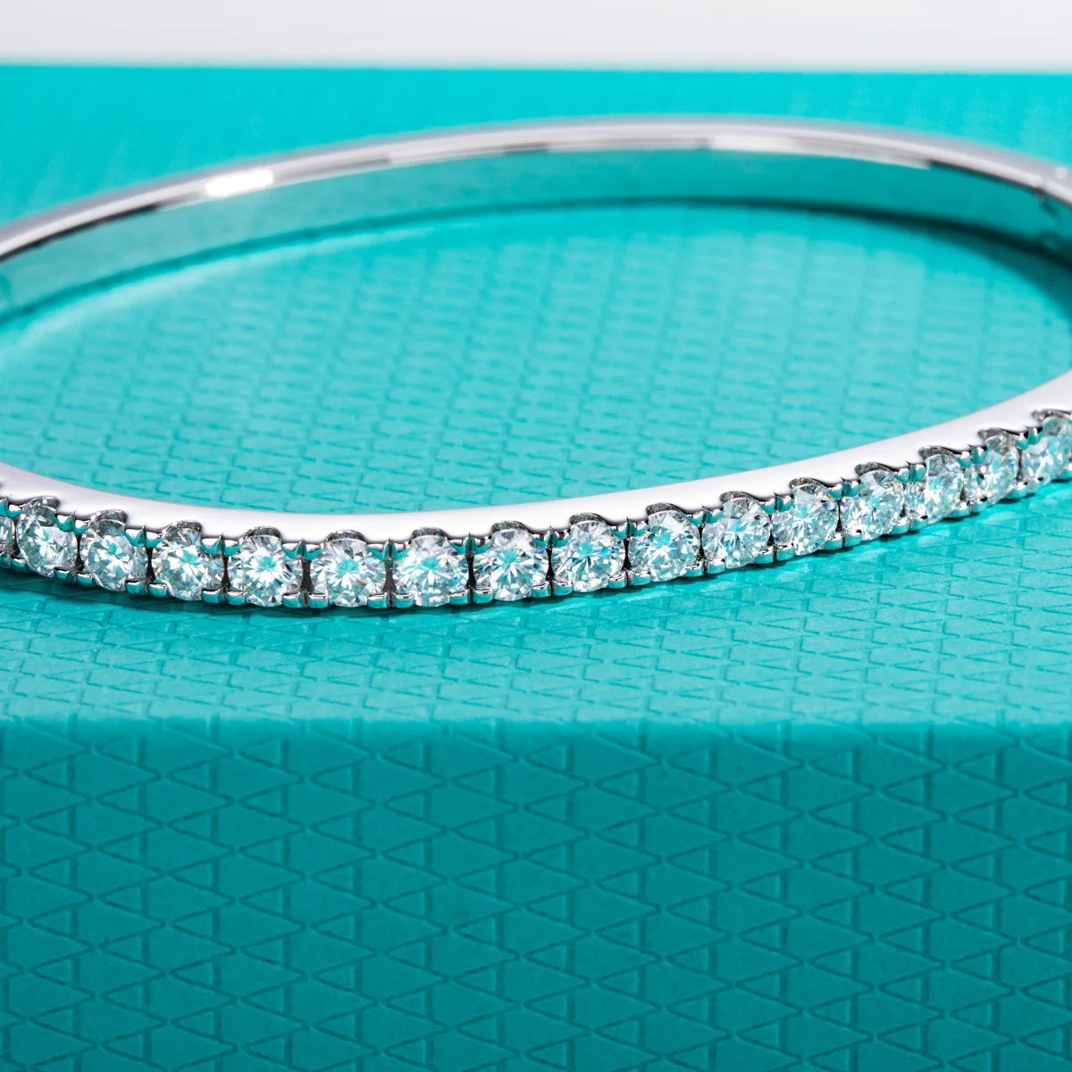 3mm moissanite eternity bangle D color VVS1, shared prong setting detail — Aurora Moissanite