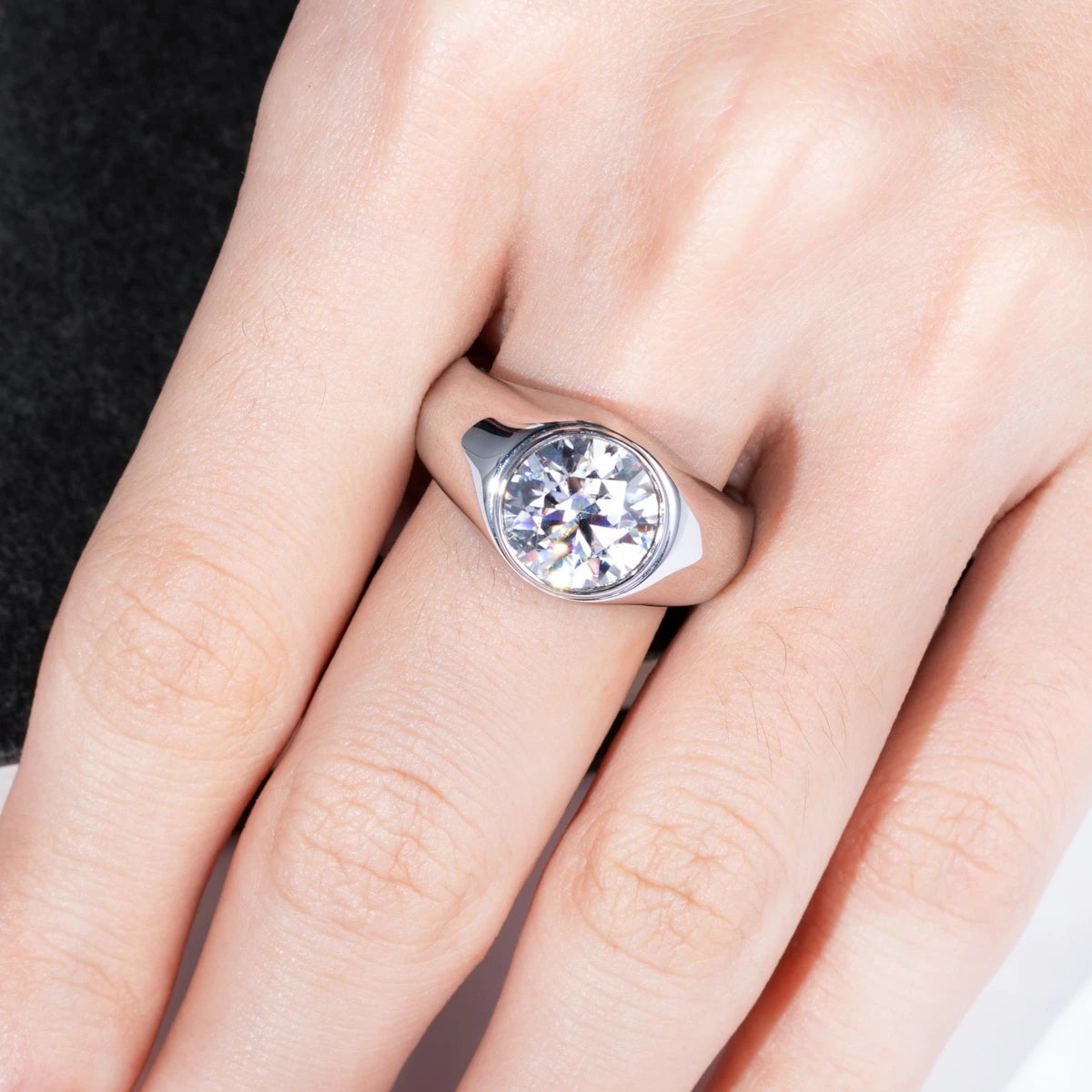 The Avar Ring lifestyle — 4ct moissanite bezel ring worn — Aurora Moissanite