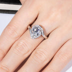 Pear halo moissanite ring top view, 2.5ct center with halo surround — Aurora Moissanite