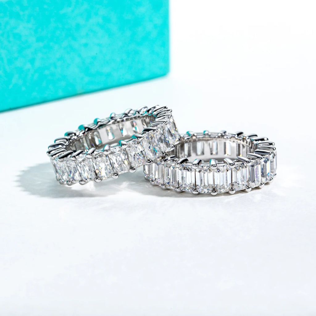 The Ember Band lifestyle — 8.1ct emerald moissanite eternity band worn on finger — Aurora Moissanite