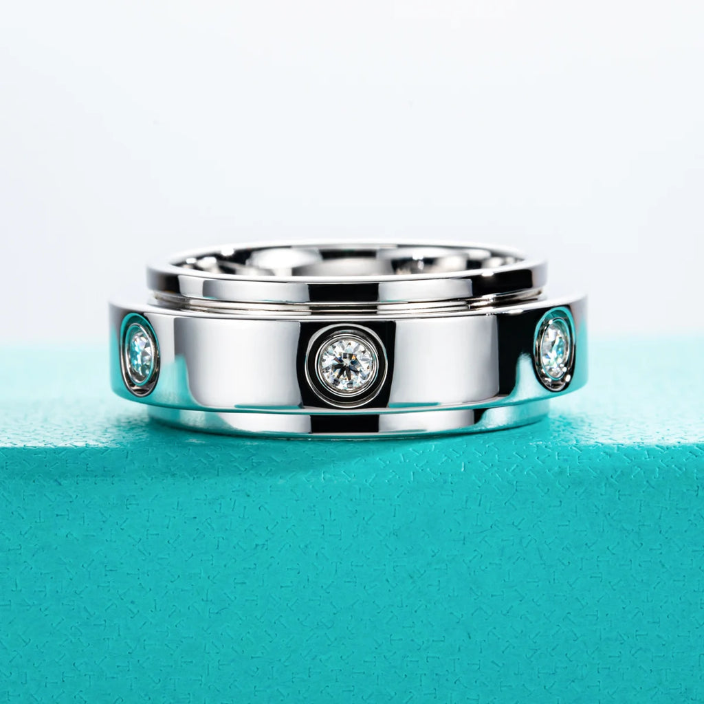 The Spin Band — 2.5mm moissanite spinner ring, front view, 14K gold plated — Aurora Moissanite