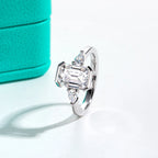 The Deia Ring worn — 3.6cttw emerald pear moissanite channel setting, 18K gold — Aurora Moissanite