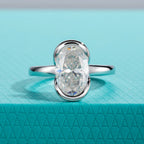 The Caer Ring worn — 3ct oval moissanite half-bezel, S925 — Aurora Moissanite