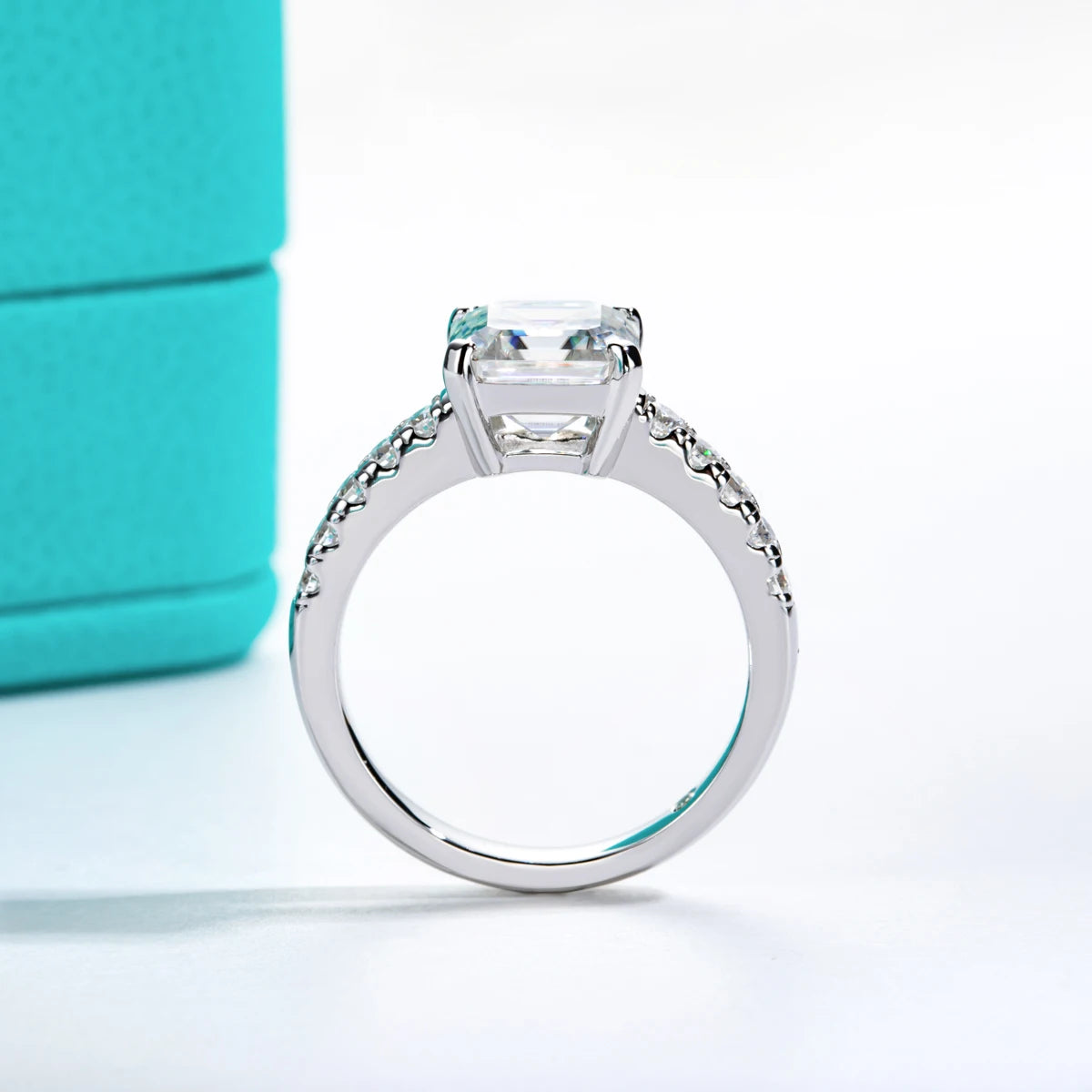 The Alix Ring lifestyle — asscher moissanite engagement ring worn on finger — Aurora Moissanite