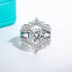 The Aeryn Ring lifestyle — three-stone moissanite ring worn on finger — Aurora Moissanite