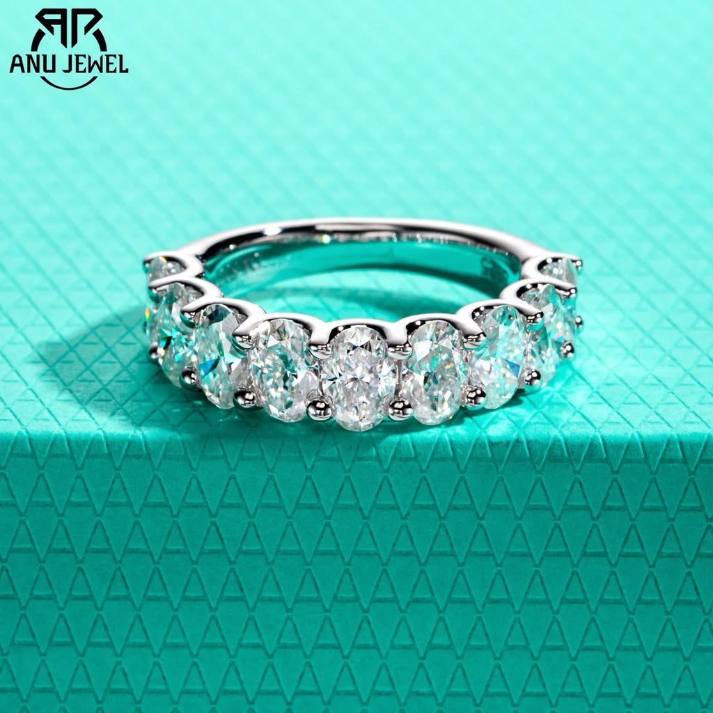 Oval moissanite half eternity band, S925 sterling silver, white background — Aurora Moissanite