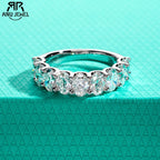 Oval moissanite half eternity band, S925 sterling silver, white background — Aurora Moissanite