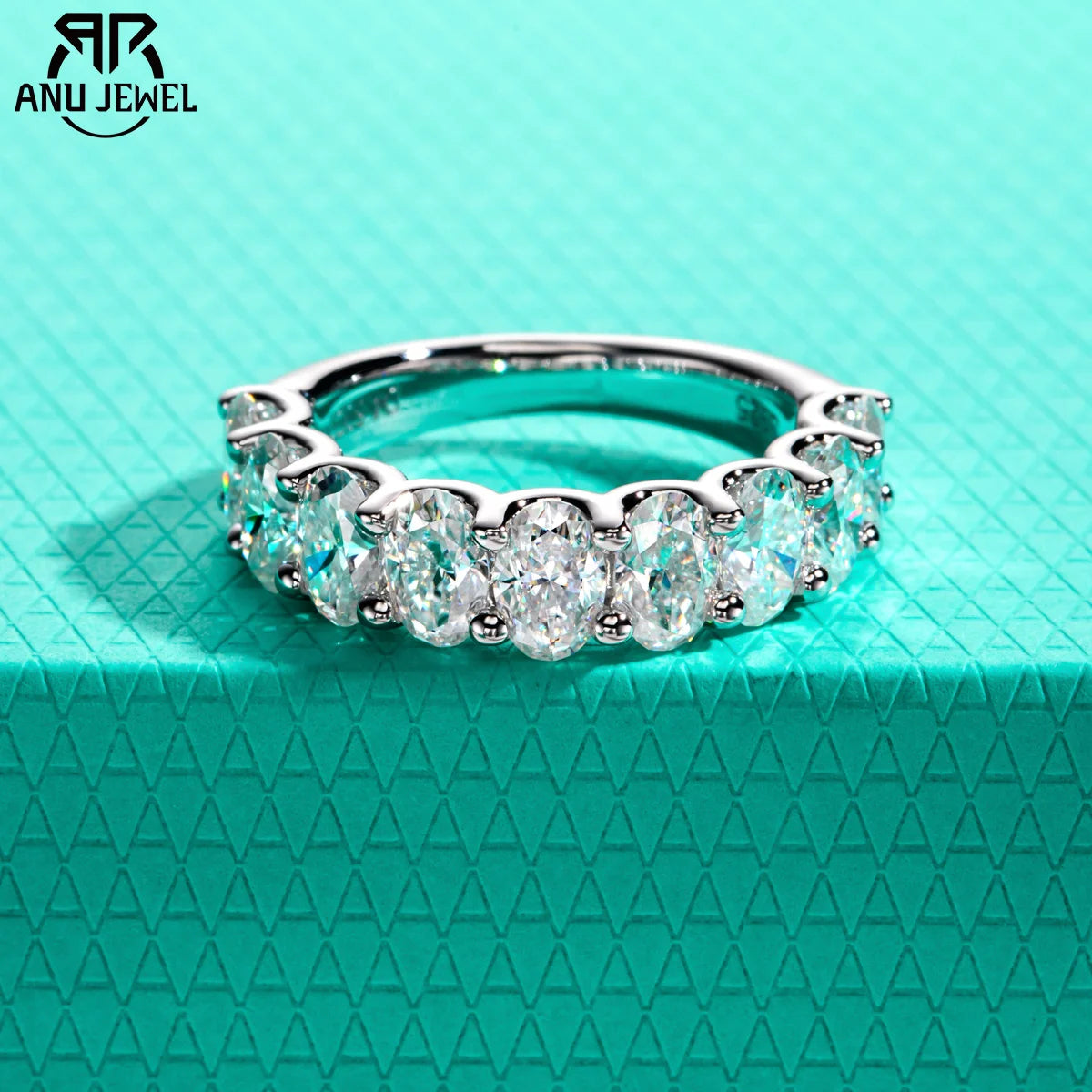 Oval moissanite half eternity band, S925 sterling silver, white background — Aurora Moissanite