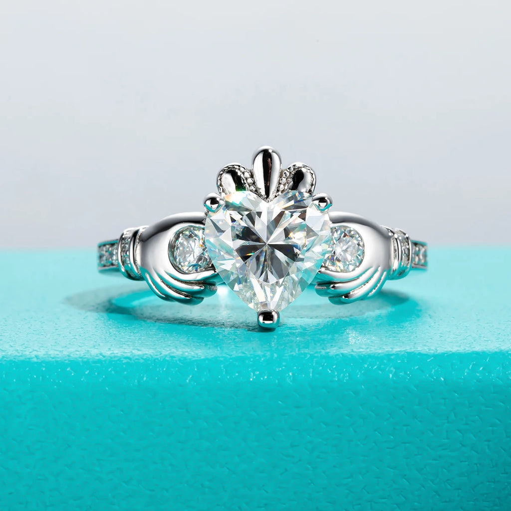 The Vela Ring worn — 2ct heart gray moissanite Claddagh ring, S925 — Aurora Moissanite
