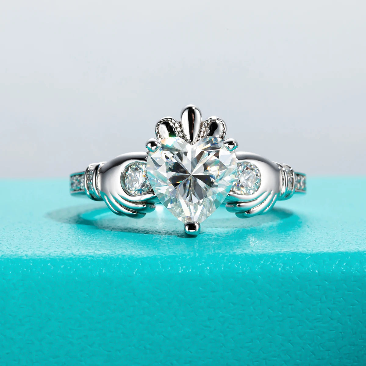 The Vela Ring worn — 2ct heart gray moissanite Claddagh ring, S925 — Aurora Moissanite
