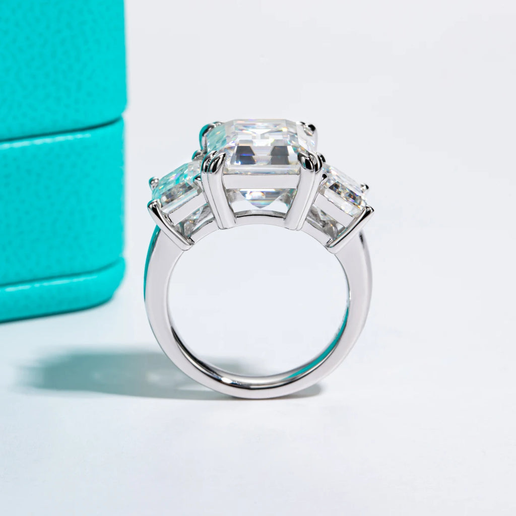 The Prism Ring lifestyle — 12ct emerald moissanite 3-stone ring worn on finger — Aurora Moissanite
