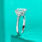 Emerald cut moissanite 3ct with pear accent 0.3ct D color VVS1, two-stone detail — Aurora Moissanite