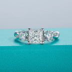 The Tove Ring — 1.5cttw princess three-stone moissanite ring, front view — Aurora Moissanite