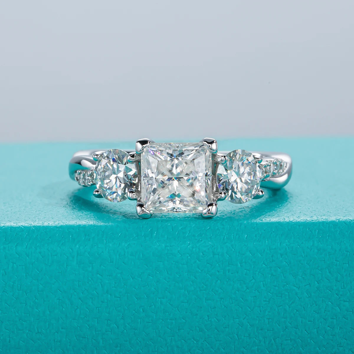 The Tove Ring — 1.5cttw princess three-stone moissanite ring, front view — Aurora Moissanite