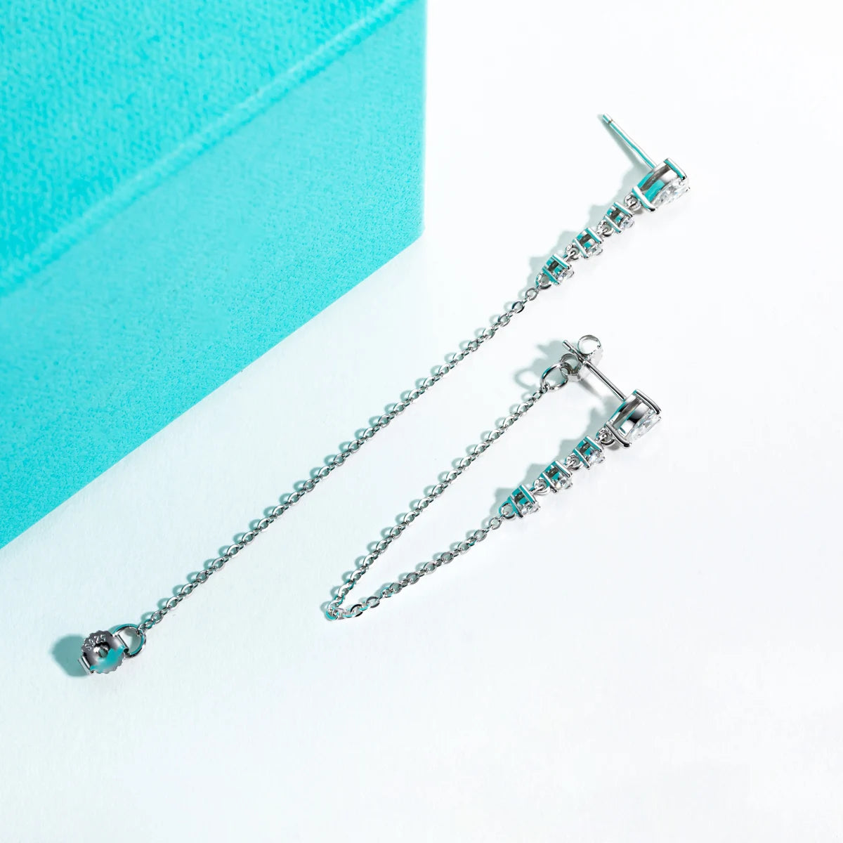 Pear moissanite drop earrings 1cttw D color VVS1, teardrop cut — Aurora Moissanite