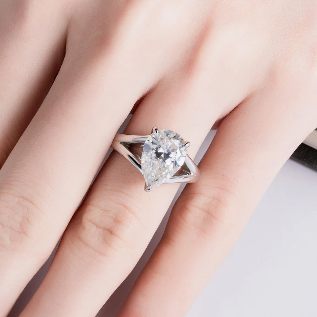 5ct pear moissanite solitaire top view, teardrop outline in prong setting — Aurora Moissanite