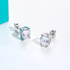 The Lume Earrings — cushion oval moissanite studs, front view — Aurora Moissanite