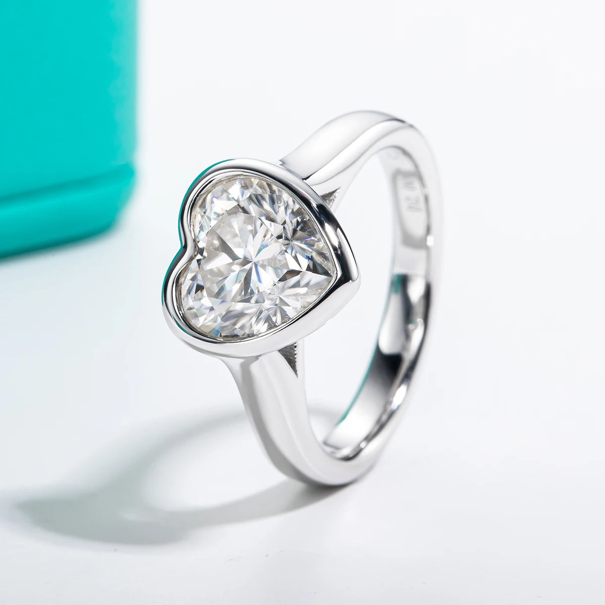 Heart cut moissanite 3ct D color VVS1, custom bezel setting detail — Aurora Moissanite