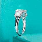 5cttw emerald three-stone moissanite ring, side profile, S925 — Aurora Moissanite