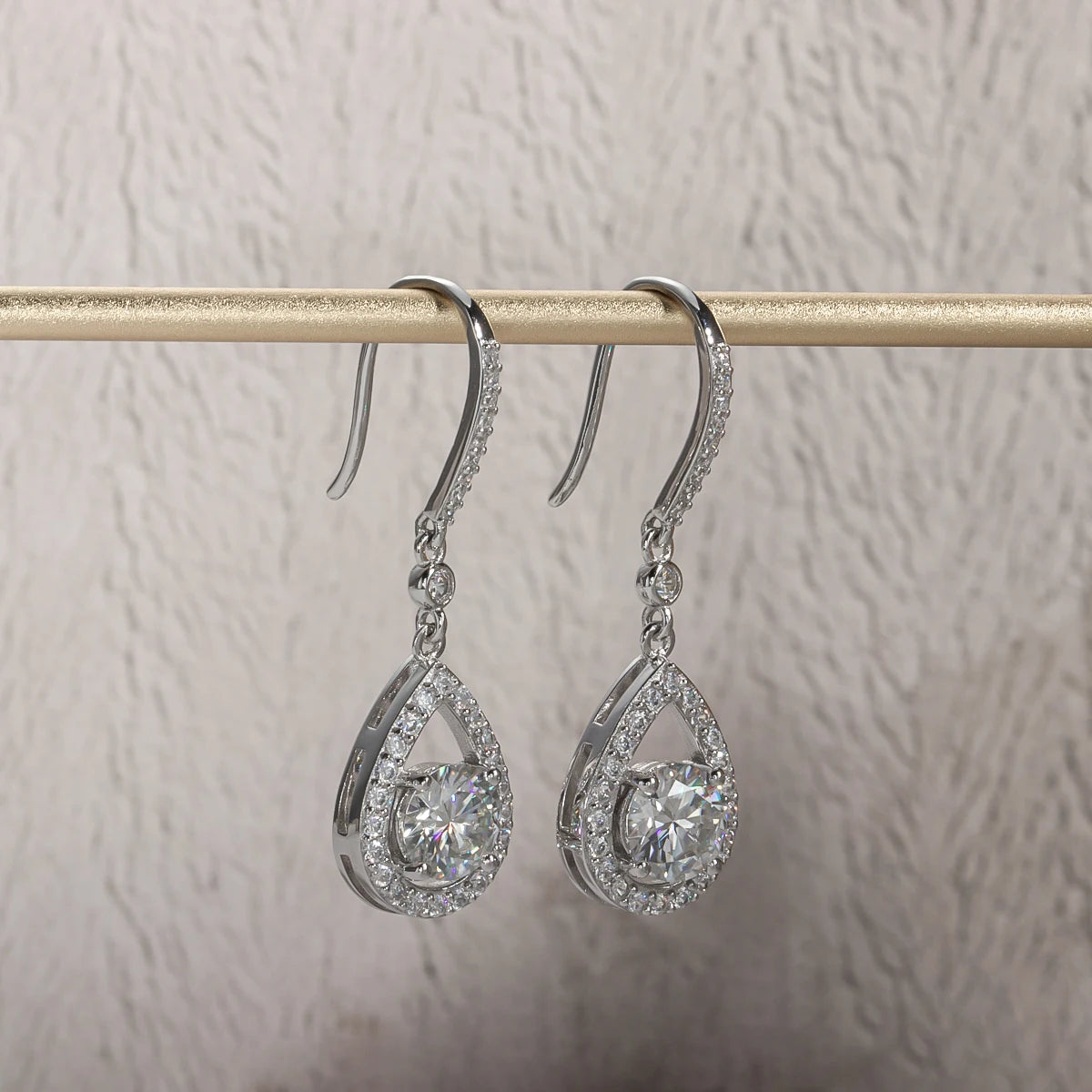 The Mael Earrings — 1ct teardrop moissanite hook drops, front — Aurora Moissanite