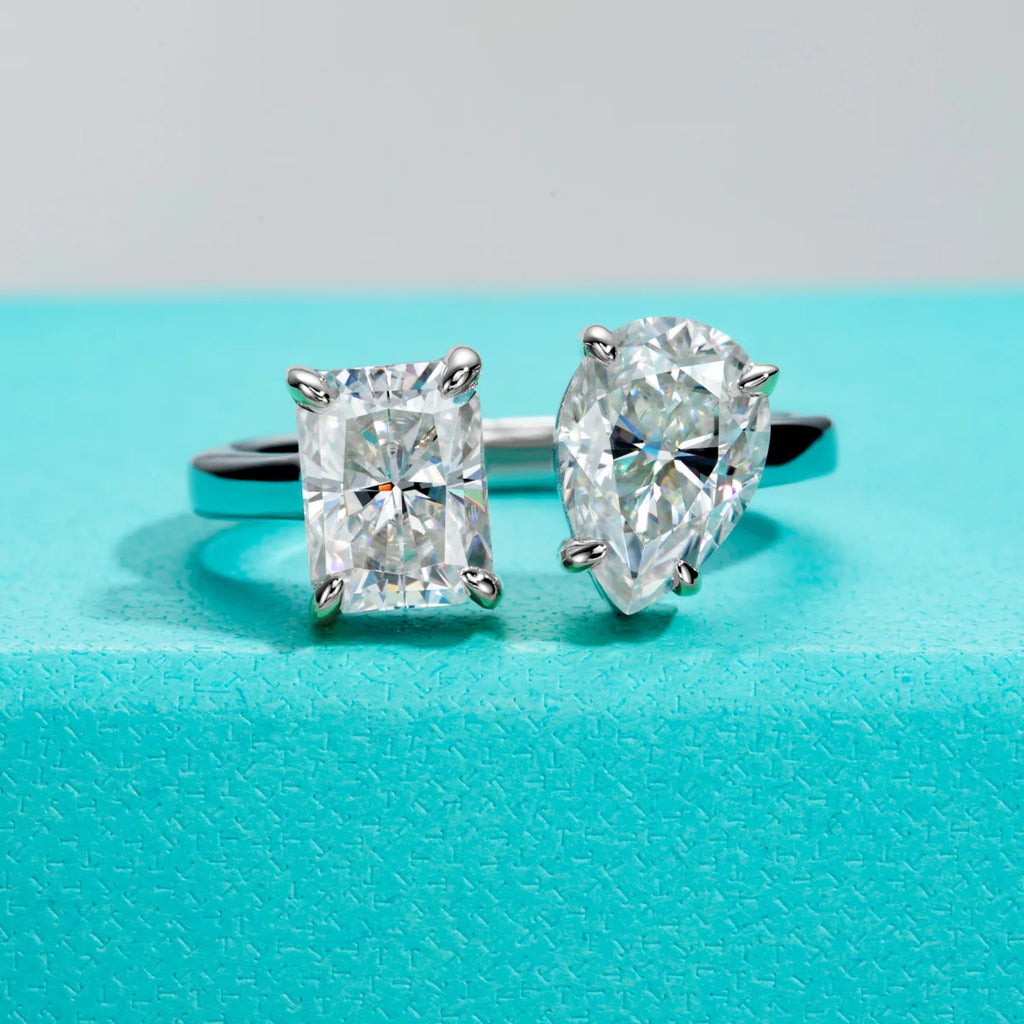 The Delta Ring — radiant pear twins moissanite toi et moi, front view — Aurora Moissanite