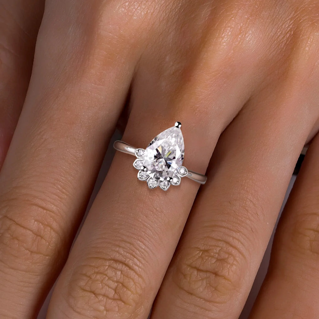 The Wren Ring lifestyle — 4ct pear moissanite crown ring worn on finger — Aurora Moissanite