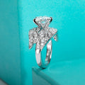 The Veil Ring worn — 4ct moissanite angel wing engagement ring, S925 — Aurora Moissanite