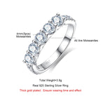 The Wave Band — 4mm moissanite 5-stone ring, front view, 18K white gold — Aurora Moissanite