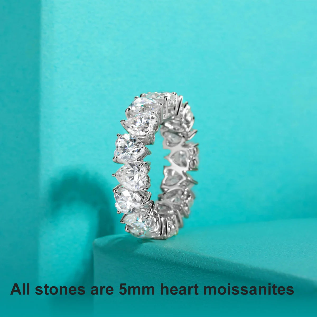 The Bloom Band worn — 5mm heart cut moissanite eternity band, 18K white gold — Aurora Moissanite