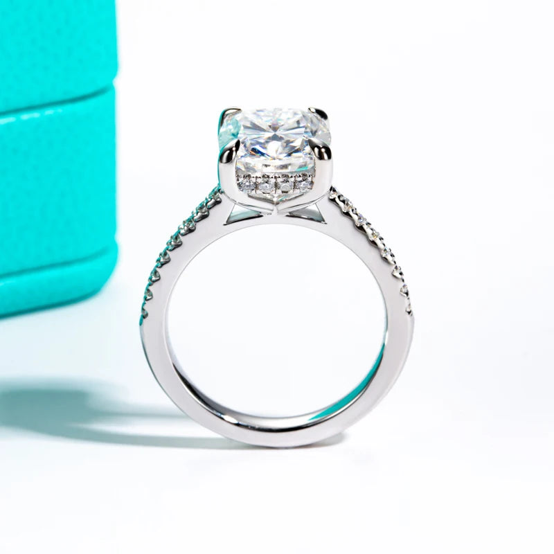 The Tyne Ring lifestyle — 5ct cushion moissanite solitaire worn on finger — Aurora Moissanite