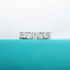 Heart cut moissanite eternity band 5mm, D color VVS1, stone detail — Aurora Moissanite