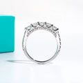 The Wave Band worn — 4mm 1.5cttw moissanite 5-stone band, 18K white gold — Aurora Moissanite