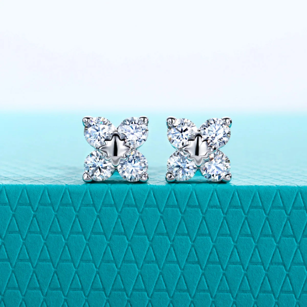 The Cail Earrings — 0.8cttw moissanite cross studs, front view — Aurora Moissanite