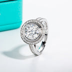 The Reva Ring — 3ct round moissanite halo ring, front view — Aurora Moissanite