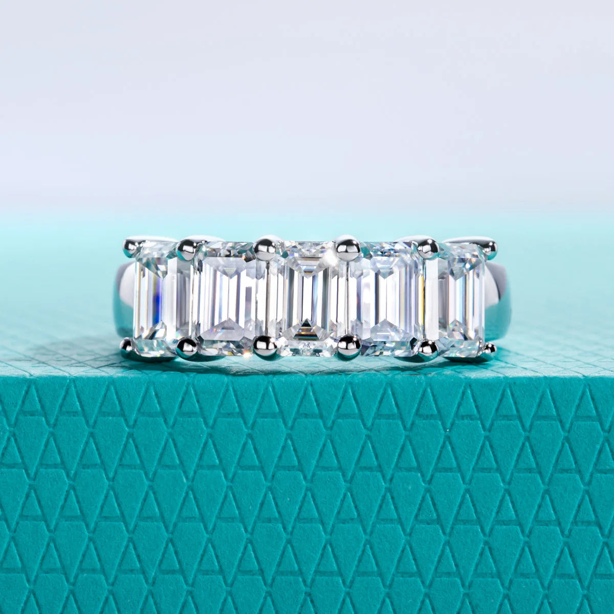 The Ember Band — emerald cut moissanite ring, front view, S925 silver — Aurora Moissanite