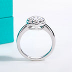The Elia Ring lifestyle — four-leaf clover moissanite bezel ring worn on finger — Aurora Moissanite