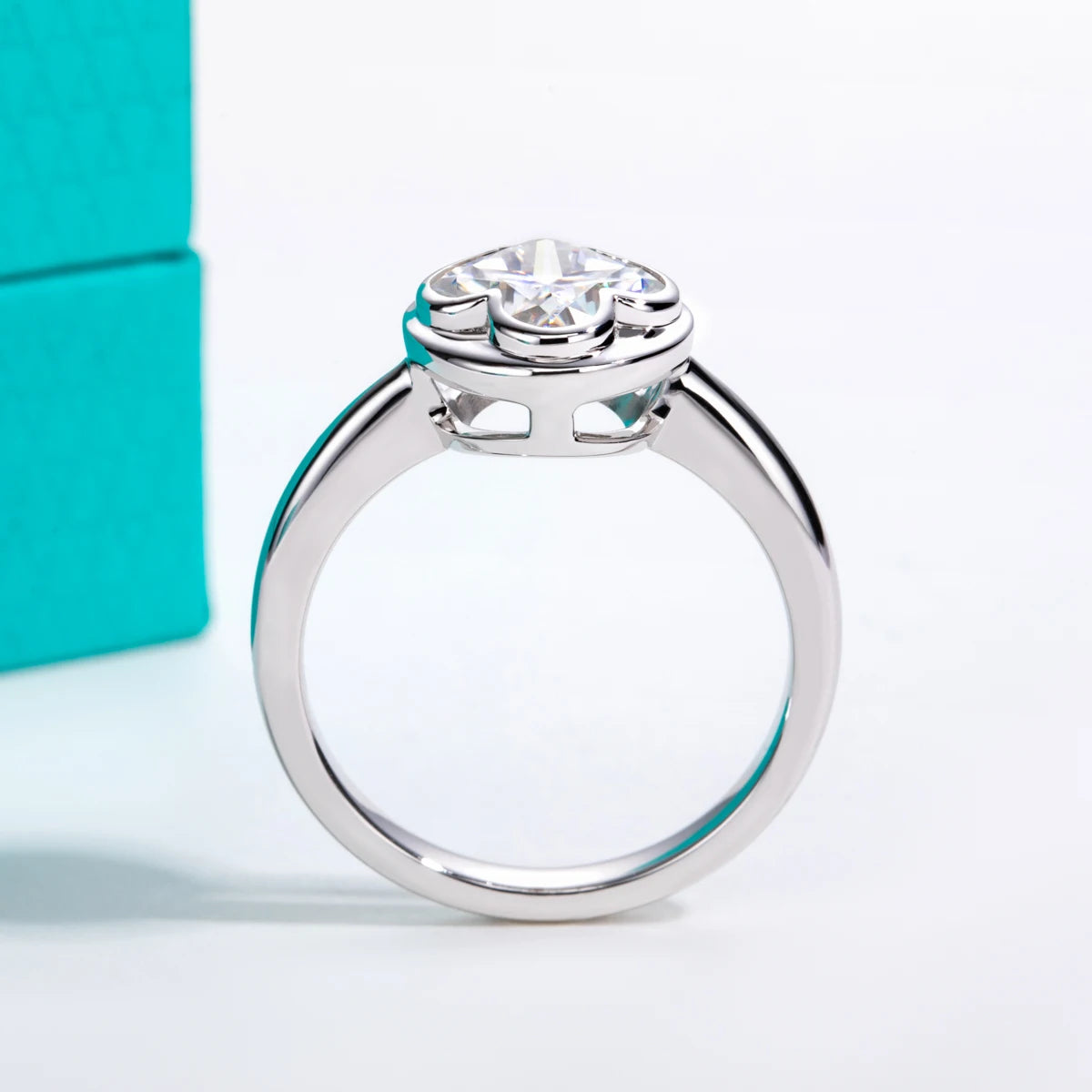 The Elia Ring lifestyle — four-leaf clover moissanite bezel ring worn on finger — Aurora Moissanite