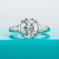 The Raen Ring worn — 3.8cttw oval moissanite, S925 — Aurora Moissanite