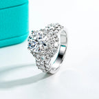 The Lune Ring lifestyle — 4.92cttw halo moissanite worn on finger — Aurora Moissanite